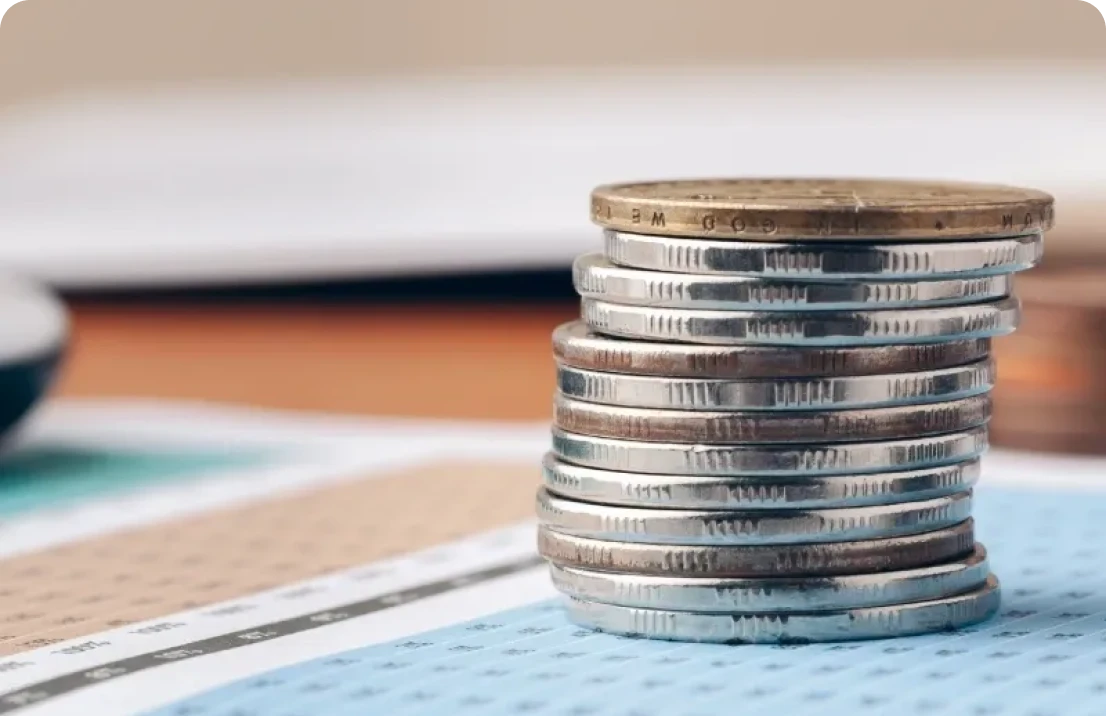 Money stack on business papers